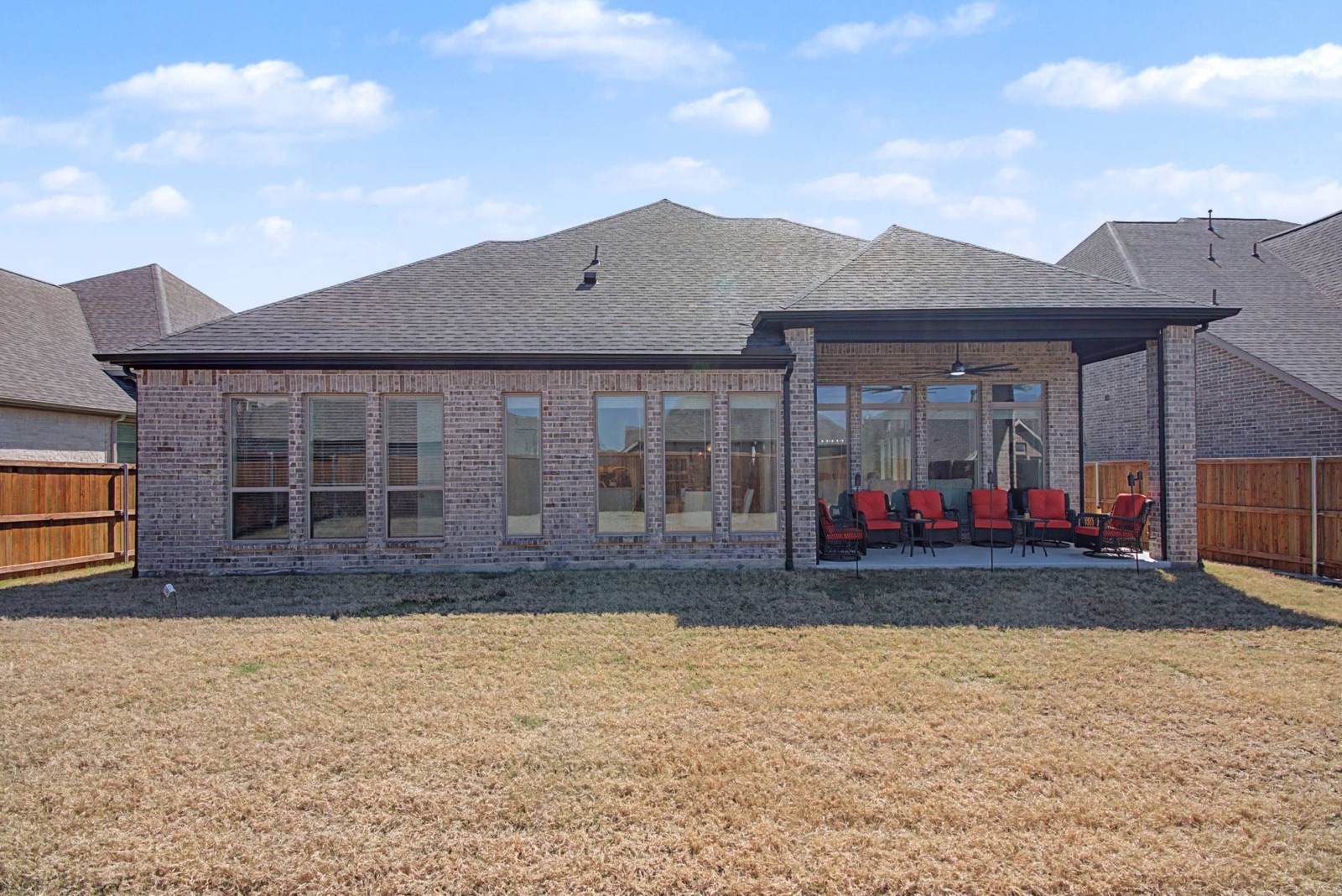 Back of the home and covered patio