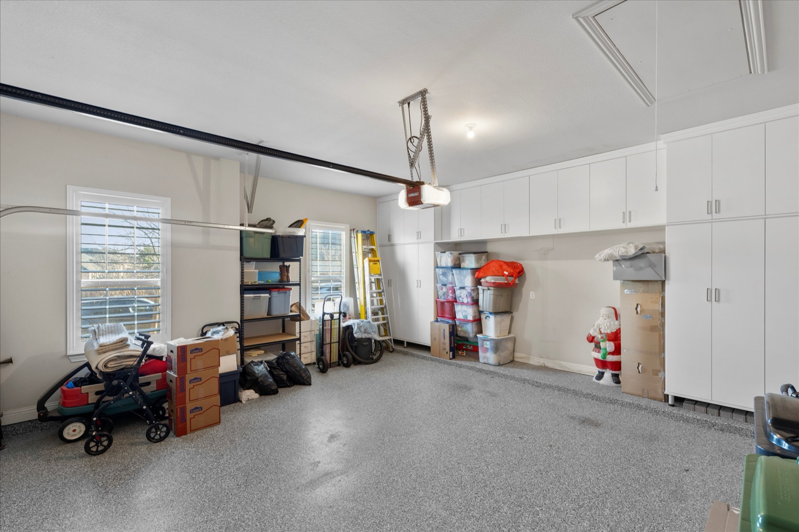 Three-car garage with epoxy floors